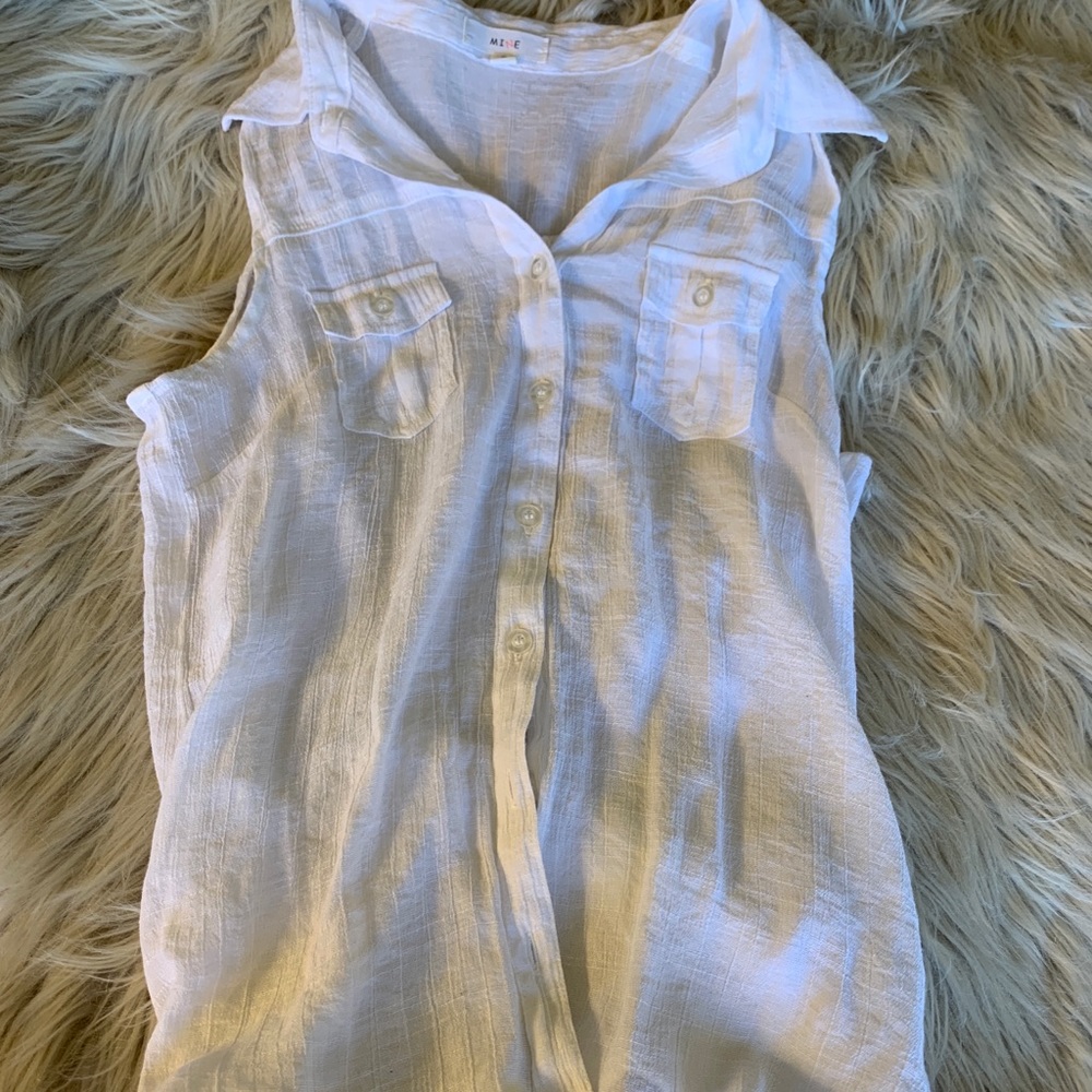 Sleeveless button down.